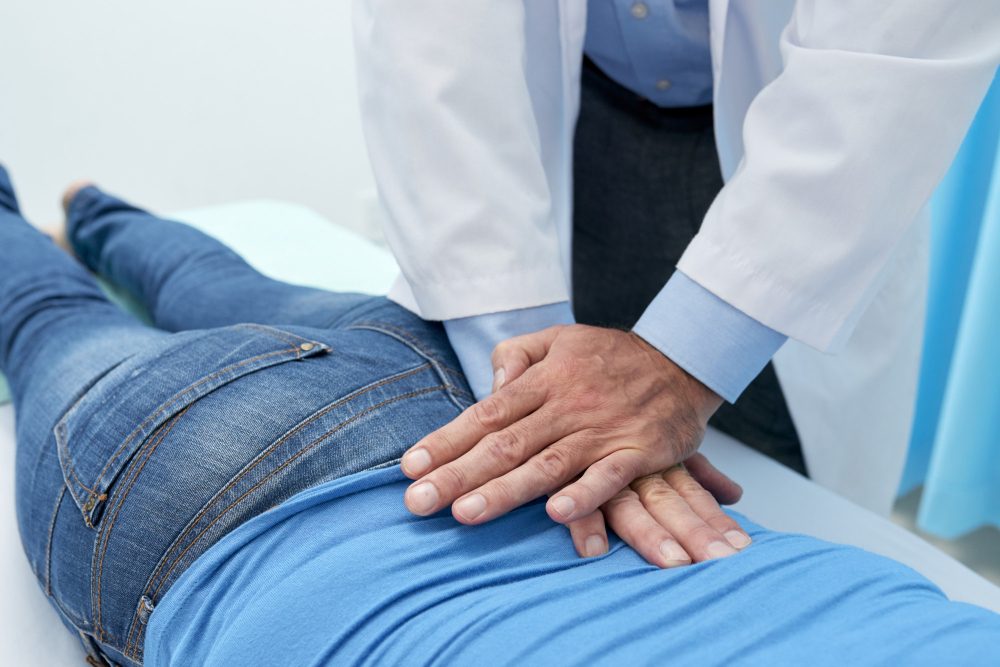 Physiotherapist guiding back injury prevention training at Sport-Fit Physio Care, Chennai